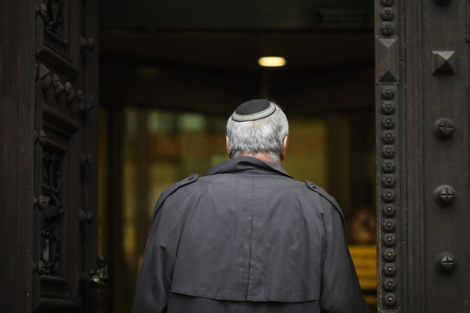 Efraim Zuroff, the head Nazi hunter from Simon Wiesenthal Center arrives at the criminal court in Hamburg, Thursday, Oct. 17, 2019. 93-year-old former SS private Bruno Dey is going on trial at the court on 5,230 counts of being an accessory to murder, accused of helping the Nazis' Stutthof concentration camp function. (AP Photo/Markus Schreiber)