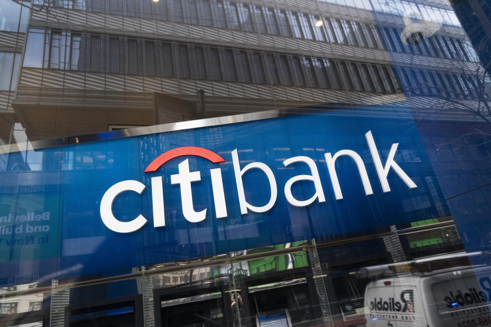 A Citibank office is open, Wednesday, Jan. 13, 2021 in New York. Citigroup Inc. says earnings for the fourth quarter of 2020 fell 7% to $4.63 billion. The New York-based bank said it had earnings of $2.08 per share, down from $2.15 per share a year earlier. (AP Photo/Mark Lennihan)