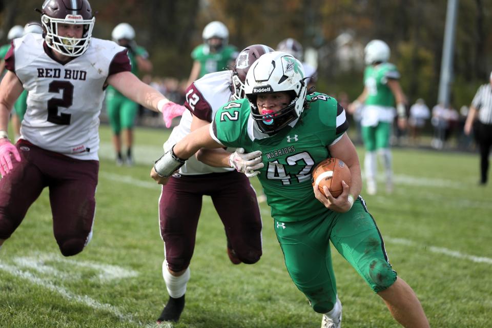 Athens' Cory Craig Jr. carries the ball during second round of the Class 2A playoffs against Red Bud on Saturday, Nov. 4, 2023.