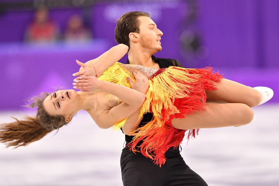 <p>Germany’s Kavita Lorenz and Germany’s Joti Polizoakis compete in the ice dance short dance of the figure skating event during the Pyeongchang 2018 Winter Olympic Games at the Gangneung Ice Arena in Gangneung on February 19, 2018. / AFP PHOTO / Mladen ANTONOV </p>