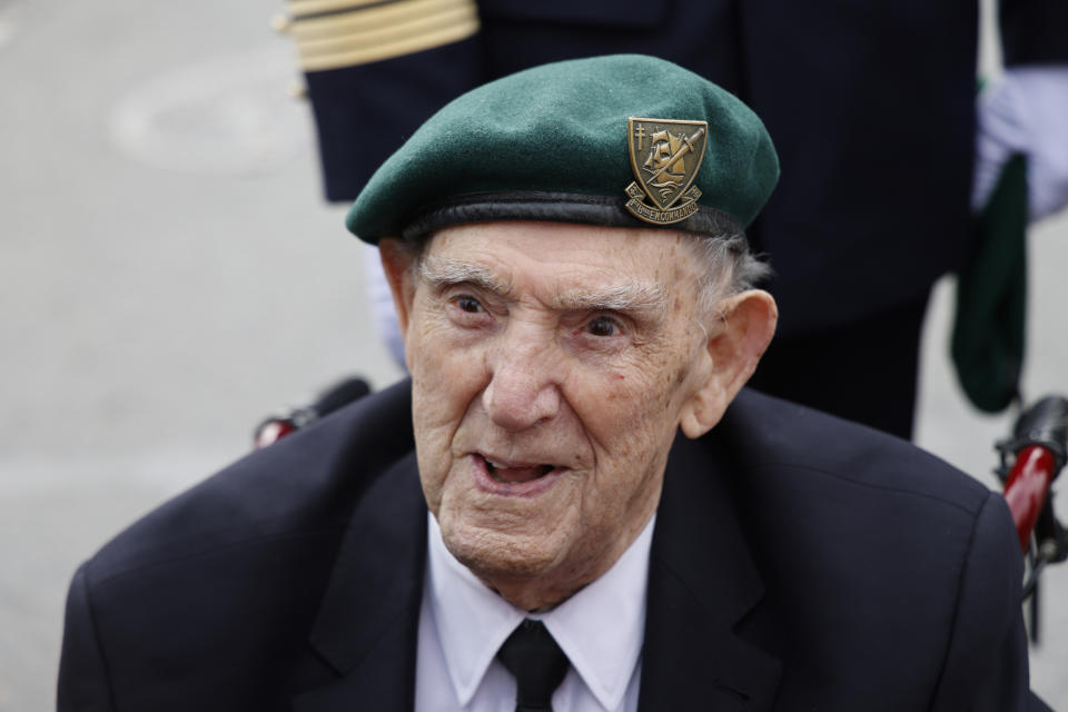 French WWII veteran of the Commando Kieffer Leon Gautier attends a ceremony in tribute to the 177 French members of the "Commando Kieffer" Fusiliers Marins commando unit who took part in the Normandy landings, as part of the 79th anniversary of D-Day, in Colleville-Montgomery, Normandy, Tuesday, June 6, 2023. World War II veterans, officials and visitors are commemorating D-Day on Normandy beaches to honor those who fought for freedom in the largest naval, air and land operation in history. ( Ludovic Marin, Pool via AP)