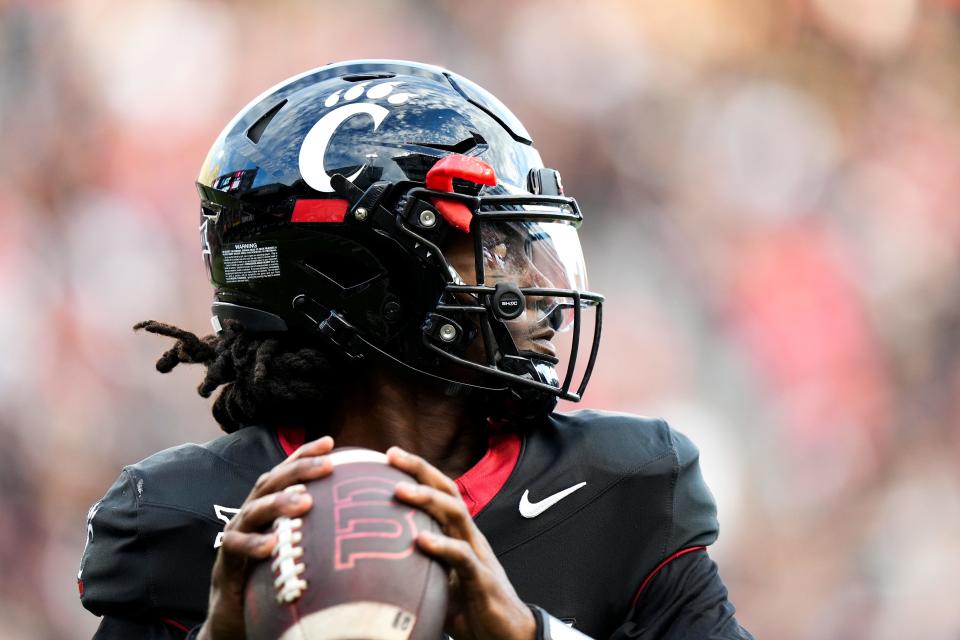 Cincinnati Bearcats quarterback Emory Jones (5) throws a pass before the NCAA football game between the Cincinnati Bearcats and the Miami RedHawks at Nippert Stadium in Cincinnati on Saturday, Sept. 16, 2023.