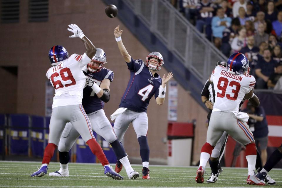 New England Patriots quarterback Jarrett Stidham (4) throws a touchdown pass against the New York Giants in a preseason game last year. (AP Photo/Steven Senne)