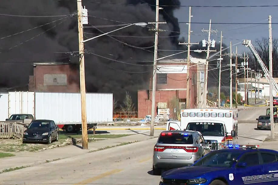 Emergency vehicles near a large fire at a plastics recycling processing facility in Richmond, Ind., on April 11, 2023. (WTHR)
