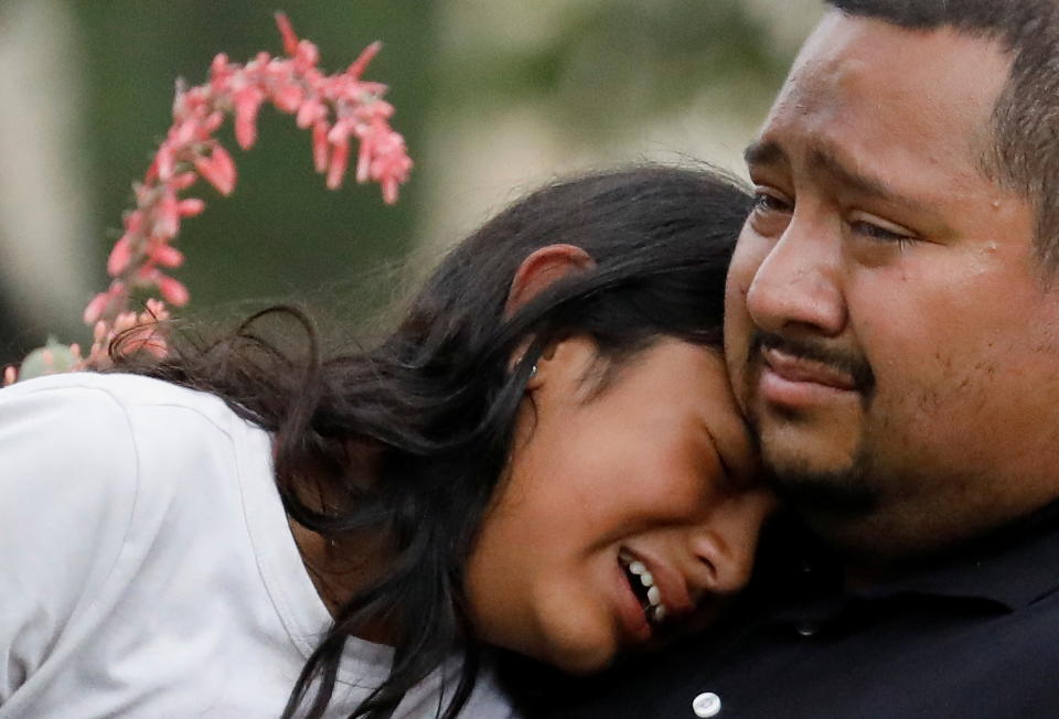 People react outside the Ssgt Willie de Leon Civic Center, where students had been transported from Robb Elementary School after a shooting, in Uvalde, Texas, U.S. May 24, 2022.  REUTERS/Marco Bello