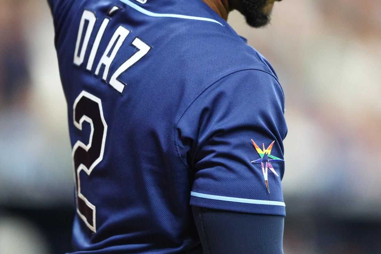 At Saturday's Pride Night game, the Tampa Bay Rays featured alternate logos on their uniform sleeves, along with a rainbow-logoed caps. However, some players peeled the decals off their sleeves and opted to wear their regular caps.