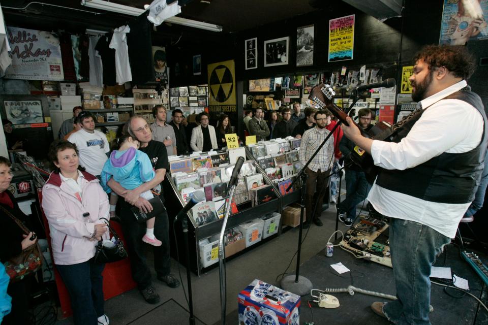 Mark Waldoch, right, with Celebrated Working Man, performs at Atomic Records, 1813 E. Locust St. in Milwaukee, on Saturday, April 19, 2008, on Record Store Day.