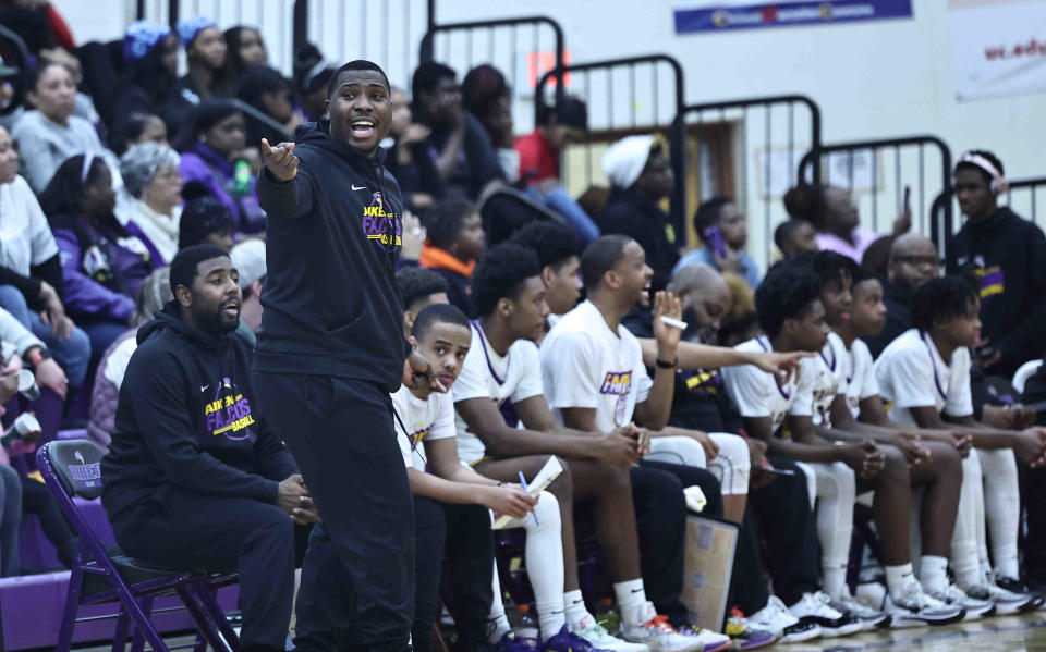 Aiken head coach Derrell Black gives instructions during the Falcons' win over Withrow Friday, Feb. 2, 2024.