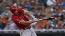 Los Angeles Angels' Mike Trout singles against the Detroit Tigers in the third inning of a baseball game in Detroit, Friday, Aug. 19, 2022. (AP Photo/Paul Sancya)