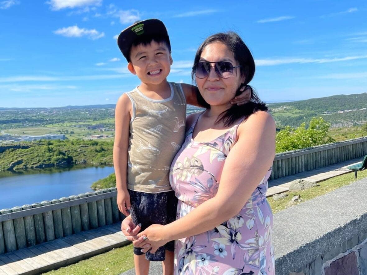 Pishum Penashue, right, said her son Owen is having nightmares about his experience with a dental procedure at the Janeway in St, John's (Submitted by Pishum Penashue - image credit)