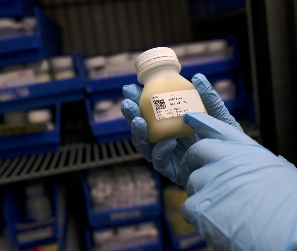 Frank Lawler IV, shows a freezer full of pasteurized milk ready for distribution at the Oklahoma Mother's Milk Bank, Friday, May 13, 2022