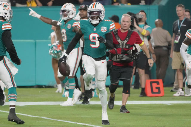 Miami Dolphins' cornerback Noah Igbinoghene (9) catches the ball