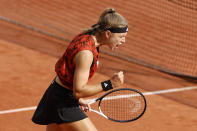 Karolina Muchova of the Czech Republic clenches her fist after breaking to 6-5 in the third set during the semifinal match of the French Open tennis tournament against Aryna Sabalenka of Belarus at the Roland Garros stadium in Paris, Thursday, June 8, 2023. (AP Photo/Jean-Francois Badias)