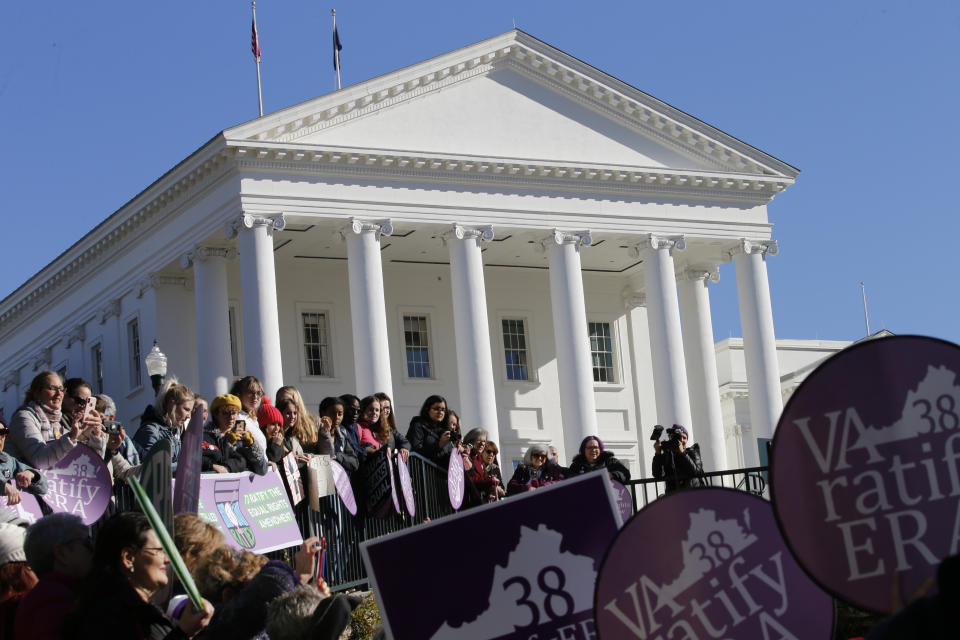 Equal Rights Amendment supporters demonstrate outside Virginia State Capitol in Richmond, Va., Wednesday, Jan. 8, 2020. The 2020 session of the Virginia Legislature begins Wednesday. (AP Photo/Steve Helber)