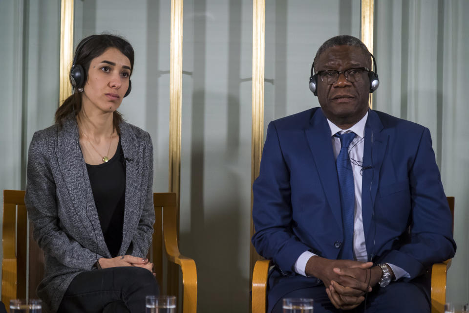 Nobel peace price laureates Nadia Murad, left, and Dr. Denis Mukwege look on during the press conference at the Nobelinstituttet in Oslo, Sunday Dec. 9, 2018. (Heiko Junge/NTB scanpix via AP)