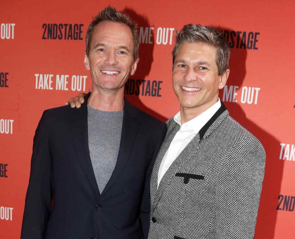 Neil Patrick Harris and David Burtka pose at the opening night of Second Stage Theater's production of "Take Me Out" on Broadway at The Hayes Theatre on April 4, 2022 in New York City