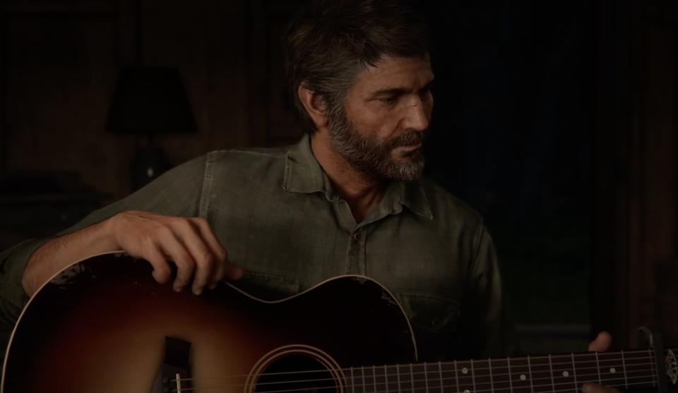 Joel playing guitar in The Last of Us Part II game