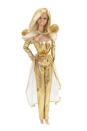 <p>Golden Dream Barbie goes in a very metallic direction, with an ensemble that brings together a strapless jumpsuit, opera-length globes, a sheer capelet and a sheer overskirt. </p>