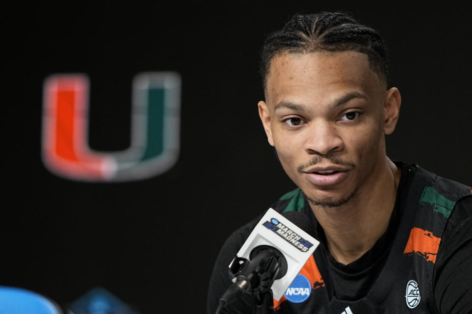 Miami guard Isaiah Wong speaks during a news conference in preparation for the Final Four college basketball game in the NCAA Tournament on Thursday, March 30, 2023, in Houston. Miami will face UConn on Saturday. (AP Photo/David J. Phillip)