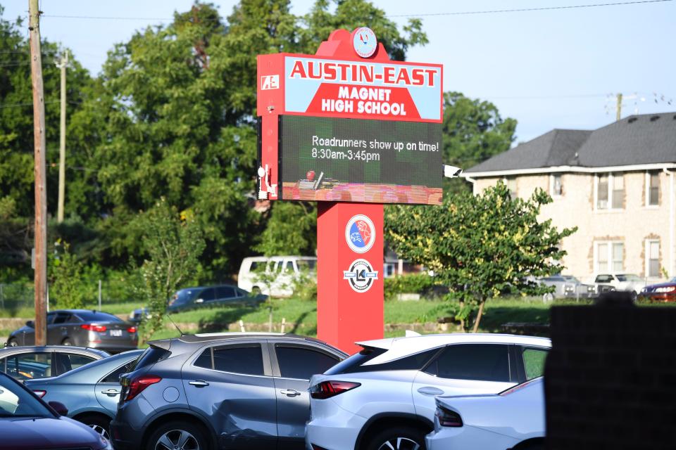 Cars pull into the parking lot at Austin-East Magnet High School on the first day of class for Knox County Schools on Aug. 8. John Wesley Manning, came to Knoxville to be principal of Austin High School on South Central Street in 1881 at the age of 24, turned it from a primary school to a well-organized preparatory school.