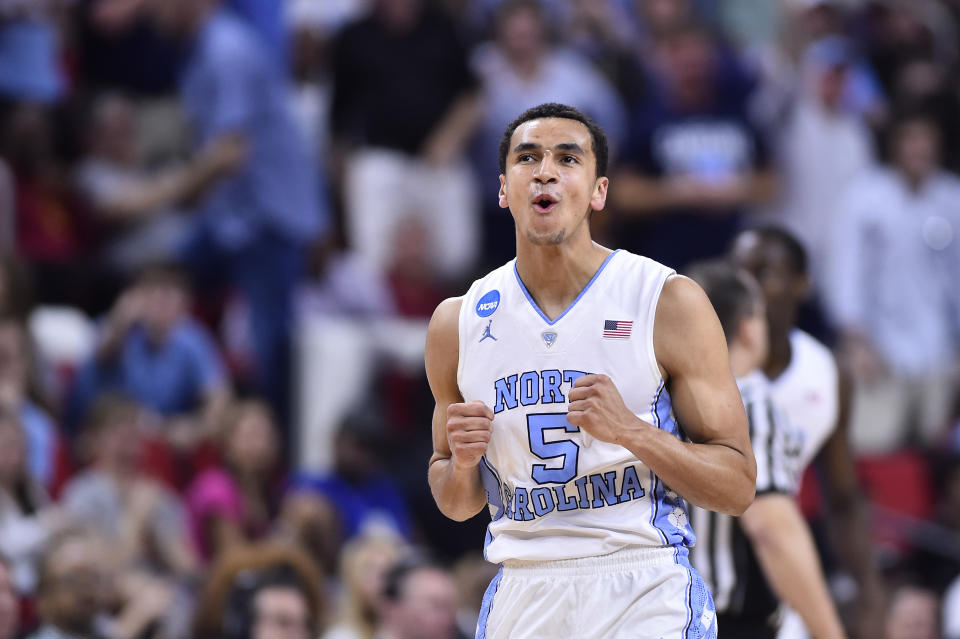 North Carolina Tar Heels guard Marcus Paige (5) celebrates on the court during the second half against the Florida Gulf Coast Eagles at PNC Arena. The Tar Heels won 83-67. Bob Donnan-USA TODAY Sports