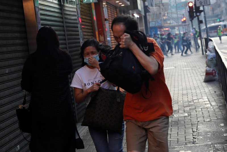 Hong Kong police fire tear gas in feverish start to 22nd weekend of protests in Hong Kong