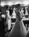 Presenters Audrey Hepburn and Grace Kelly wait backstage at the RKO Pantages Theatre during the 1956 Academy Awards. (Allan Grant—Time & Life Pictures) <br> <br> <a href="http://life.time.com/culture/oscars-classic-photos-from-hollywoods-biggest-night/#1" rel="nofollow noopener" target="_blank" data-ylk="slk:Click here to see the full collection at LIFE.com;elm:context_link;itc:0;sec:content-canvas" class="link ">Click here to see the full collection at LIFE.com</a>