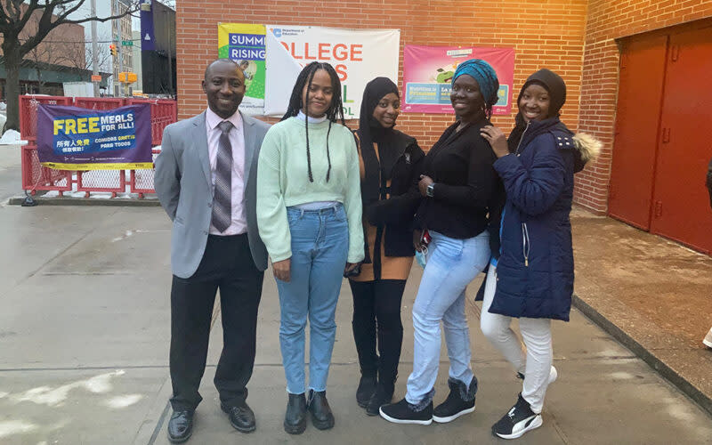 Alhassan Susso and his students outside International Community High School in the Mott Haven section of the Bronx. (Jo Napolitano)