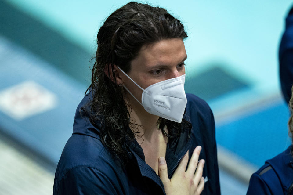 Pennsylvania's Lia Thomas is shown during the playing of the national anthem before a swim meet, Saturday, Jan. 8, 2022, in Philadelphia. The NCAA has adopted a sport-by-sport approach for transgender athletes, bringing the organization in line with the U.S. and International Olympic Committees. NCAA rules on transgender athletes returned to the forefront when Penn swimmer Lia Thomas started smashing records this year.(AP Photo/Chris Szagola)