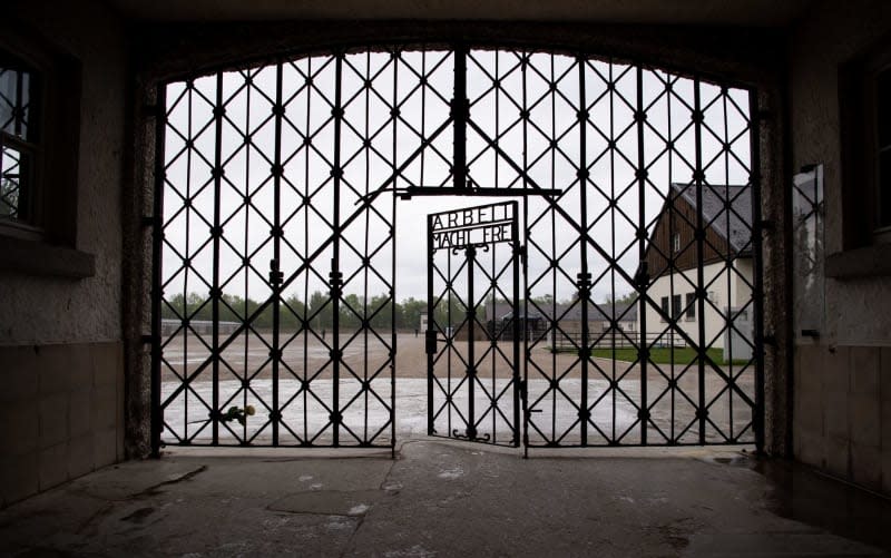 The entrance gate with the inscription "Arbeit macht frei" can be seen at the Dachau concentration camp memorial. The secret diary of Edgar Kupfer-Koberwitz from his imprisonment in the Dachau concentration camp has been published in the form of a graphic novel, YouTube film and online text. Sven Hoppe/dpa