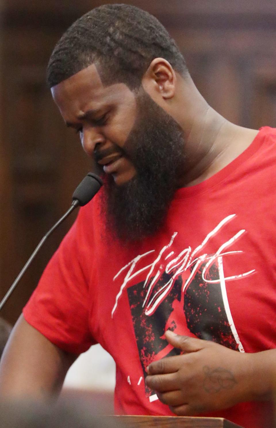 Scottie Bradford speaks on behalf of his brother, Reginald Carter prior to Carter's sentencing in Summit County Common Pleas Judge Alison McCarty's courtroom in Akron. Carter was sentenced to 22 to 26 years for a July 2021 shooting in Springfield Township where two 18 year men where shot.