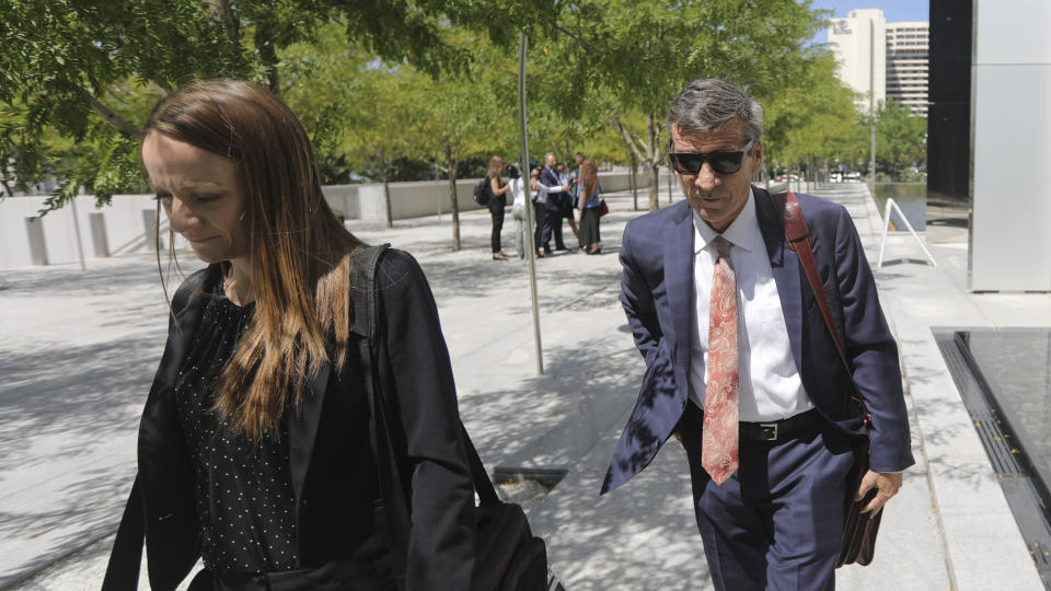 Defense attorney Greg Skordas leaves the federal courthouse Monday, Aug. 12, 2019, in Salt Lake City. Lawyers for a man accused of running a multi-million-dollar opioid ring out of his suburban Salt Lake City basement said he was involved in drugs but wasn't capable of running such a major operation. Aaron Shamo, 29, has a learning disability and attention deficit hyperactivity disorder that make him incapable of orchestrating the complicated scheme that prosecutors laid out in court documents, Skordas said during his opening statement at Shamo's trial. (AP Photo/Rick Bowmer)
