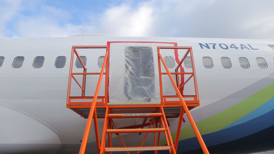 The NTSB shared this image of the Alaska Airlines aircraft as they investigate the blown door plug. - National Transportation Safety Board