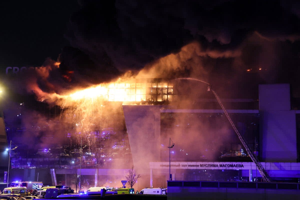 A view shows the burning Crocus City Hall concert hall following the shooting incident in Krasnogorsk, outside Moscow, on 22 March 2024. (AFP via Getty Images)