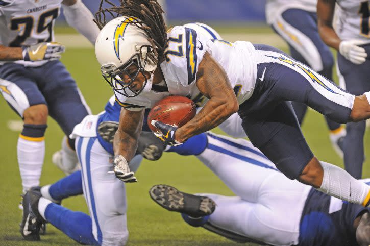 Sep 25, 2016; Indianapolis, IN, USA; San Diego Chargers corner back Jason Verrett (22) tries to advance a punt against the Indianapolis Colts at Lucas Oil Stadium. Mandatory Credit: Thomas J. Russo-USA TODAY Sports