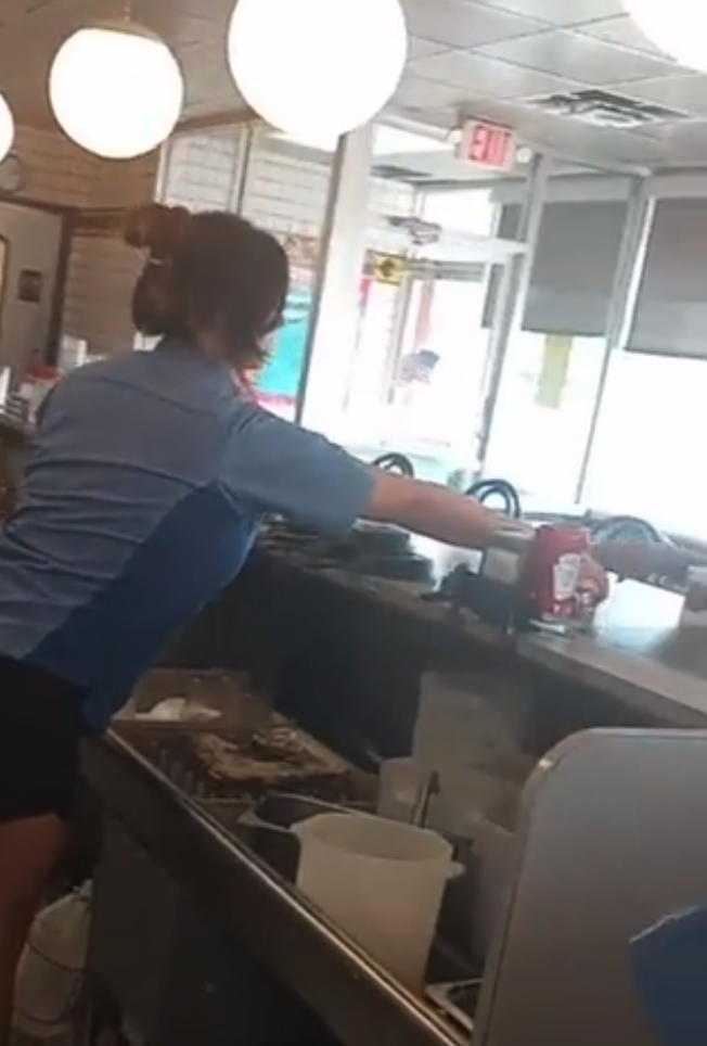 lana working behind the counter