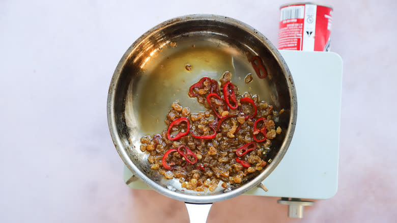 Syrupy agrodolce sauce in pan