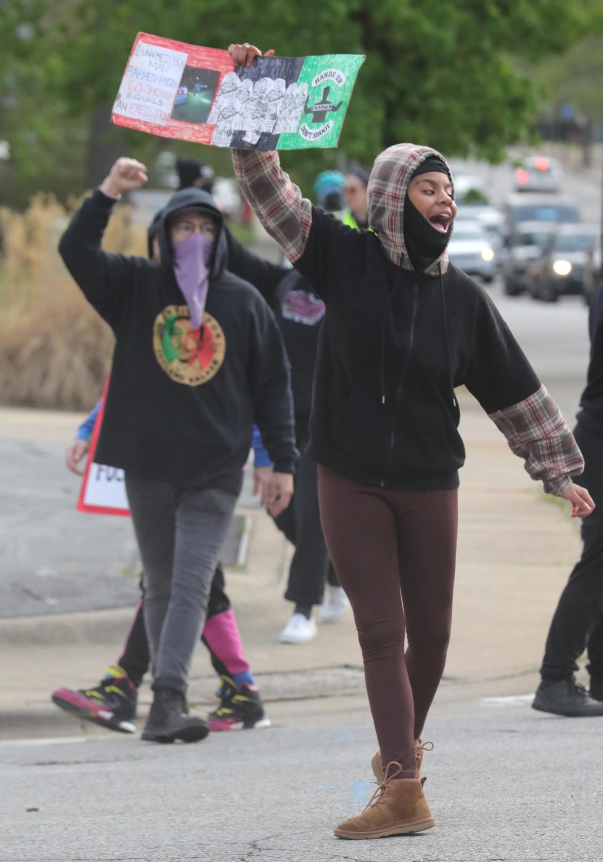 Jayland Walker protesters march along Cuyahoga Falls Avenue on Monday, April 24, 2023, in Akron.