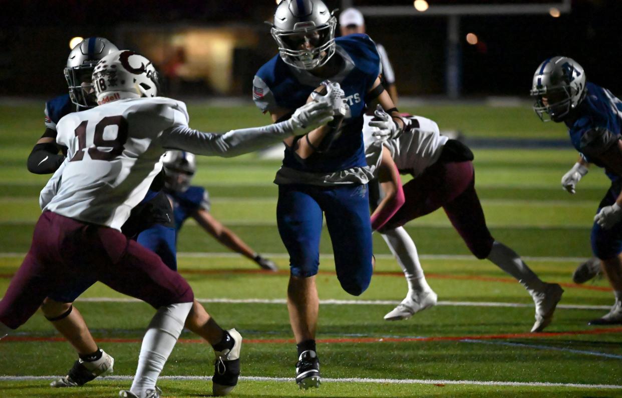 Auburn's Nathan Cook runs the ball into the end zone.