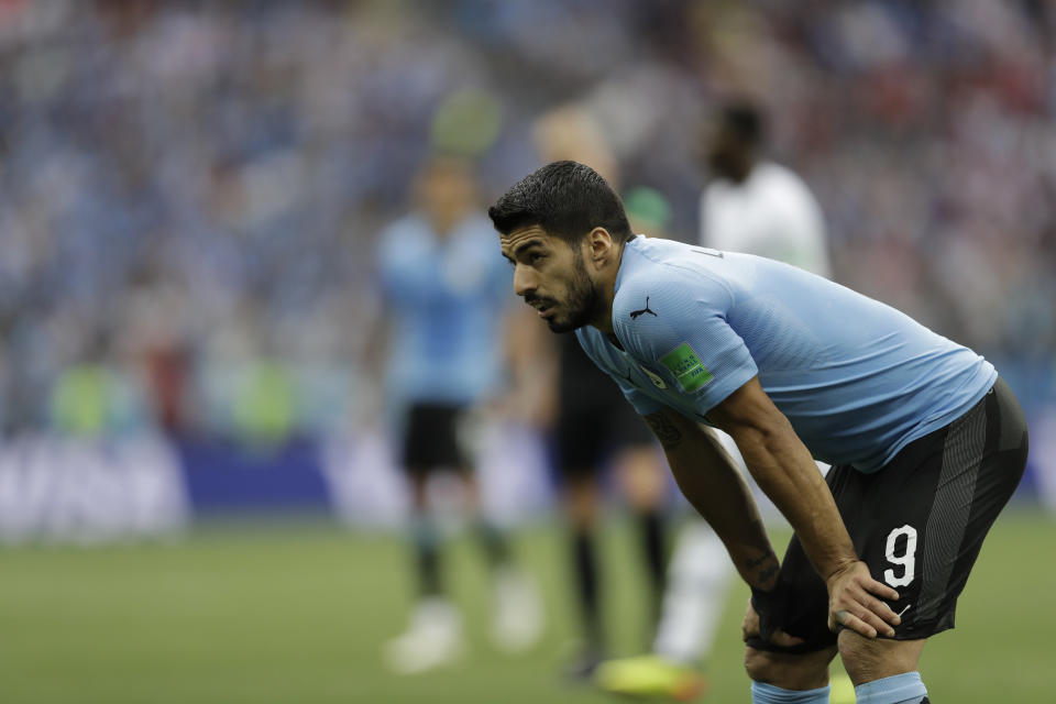 <p>Uruguay’s Luis Suarez reacts to seeing his team fall behind </p>