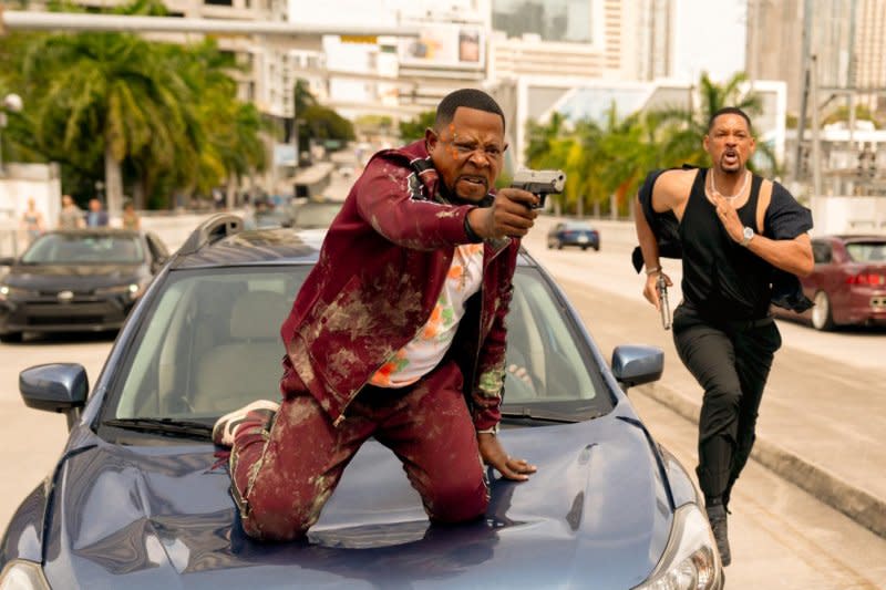 Martin Lawrence (L) and Will Smith recreate an iconic scene from the first "Bad Boys." Photo courtesy of Sony Pictures