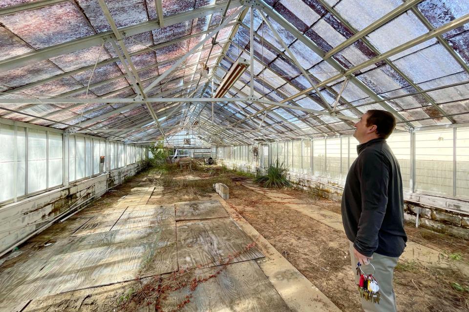 Jon Williams, assistant director of Okaloosa Technical College, surveys an empty greenhouse on the college's property which will serve as a temporary home of the Okaloosa County Extension Service in the south end of the county. The agency's old building on Hollywood Boulevard was damaged during Hurricane Sally in 2020, and the Florida Legislature last year approved $854,100 to build a new 2,800-square-foot facility on Lewis Turner Boulevard.