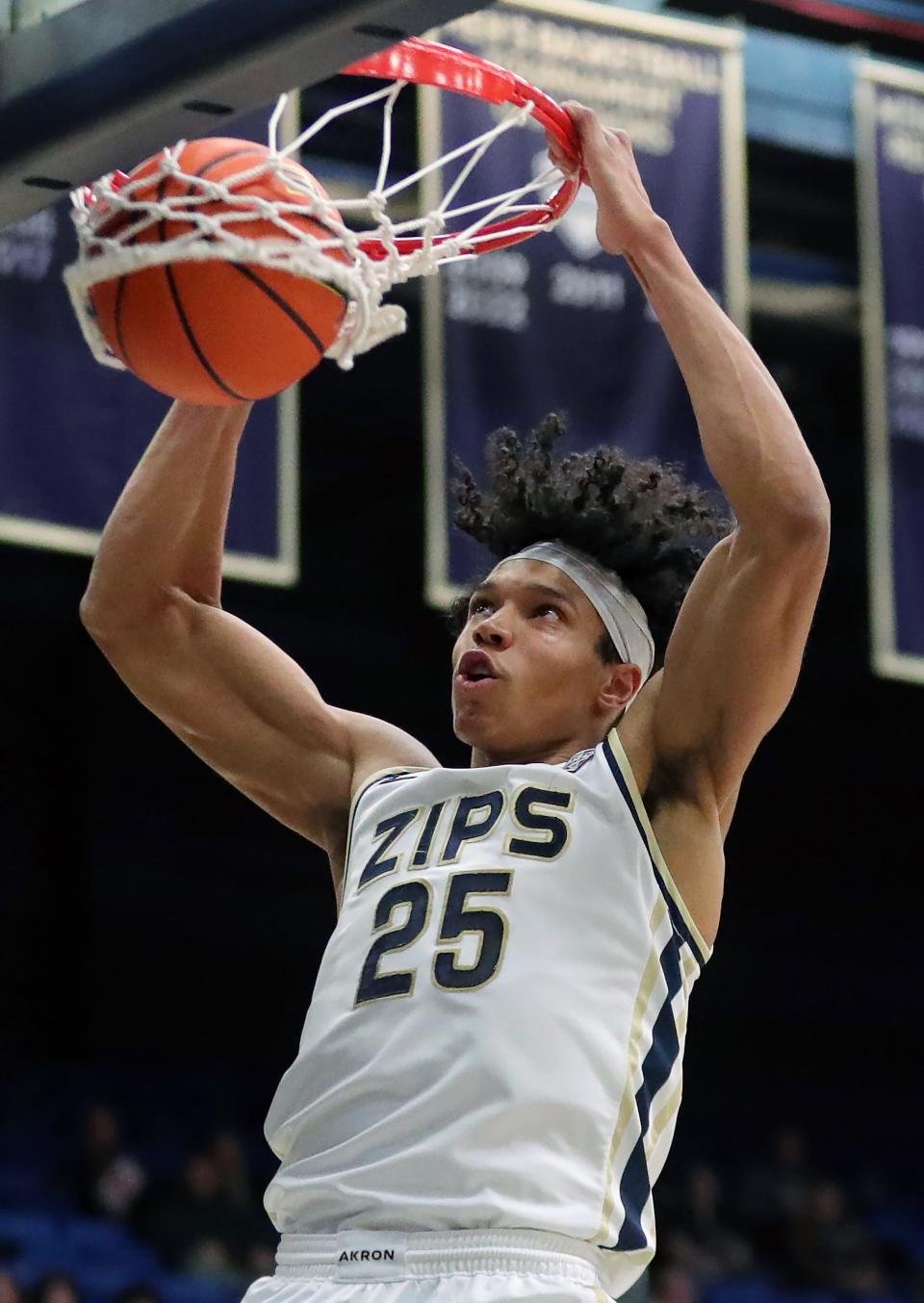 Akron Zips forward Enrique Freeman (25) dunks the ball against Bowling Green on Jan. 5 in Akron.