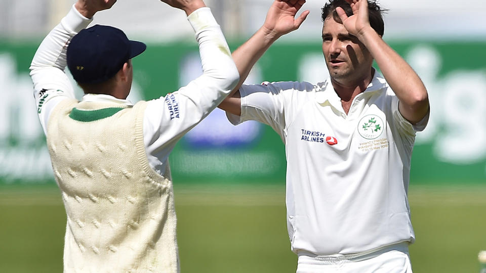 Tim Murtagh celebrates a wicket. (Photo by Charles McQuillan/Getty Images)