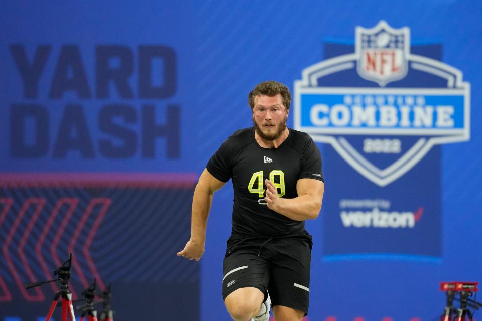 Cole Strange runs the 40-yard dash at the NFL Combine in Indianapolis on March 4.