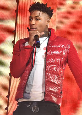 <p>Paras Griffin/Getty </p> NBA YoungBoy performs onstage during Lil Baby & Friends concert to promote the new release of Lil Baby's new album "Street Gossip" on November 29, 2018 in Atlanta, Georgia.