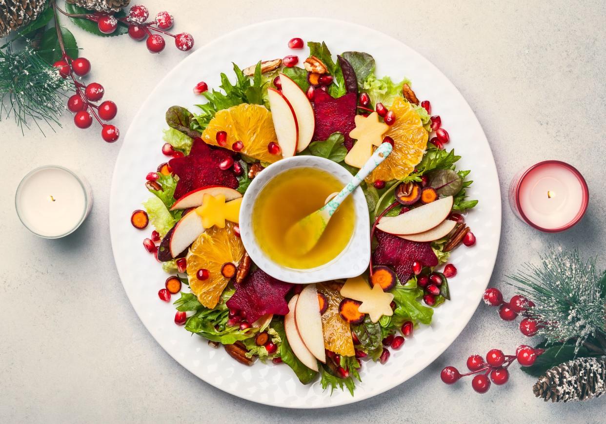 Christmas wreath salad with beetroot,apple,oranges and honey-mustard sauce.