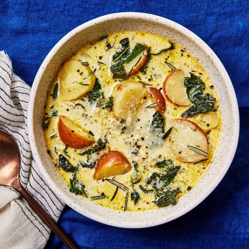 <p>This healthy soup recipe has a rich, yet light and velvety texture. Serve with crusty bread and a glass of wine for a cozy meal.</p> <p> <a href="https://www.eatingwell.com/recipe/7921952/vegetarian-potato-kale-soup/" rel="nofollow noopener" target="_blank" data-ylk="slk:View Recipe;elm:context_link;itc:0;sec:content-canvas" class="link ">View Recipe</a></p>