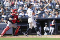 New York Yankees' Oswaldo Cabrera watches his home run along with Boston Red Sox catcher Reese McGuire during the fourth inning a baseball game against the Red Sox Saturday, Sept. 24, 2022, in New York. (AP Photo/Jessie Alcheh)