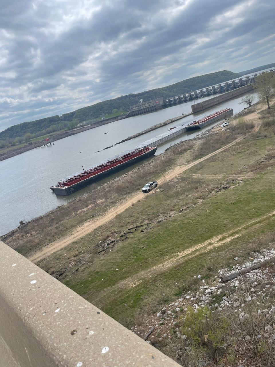 U.S. Highway 59 south of Sallisaw was shut down on Saturday after a barge struck a bridge at the Kerr Reservoir, according to Oklahoma Highway Patrol.
